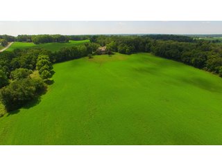 TRACT 1 WITH 2 IN BACKGROUND - REAL ESTATE AUCTION - 2 PRESTIGUOUS HOMES - 66+/- ACRES IN 5 TRACTS IN NOBLE COUNTY, INDIANA